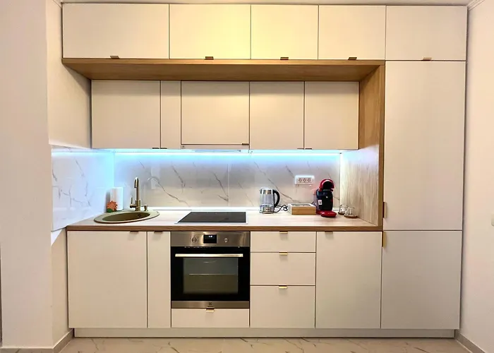 One Luxe - Апартаменти